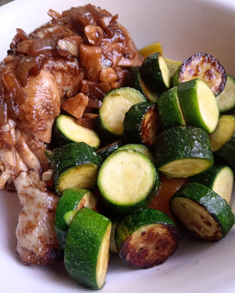 Creamy chicken adobo served with steamed pumpkin and pan-fried baby marrows.