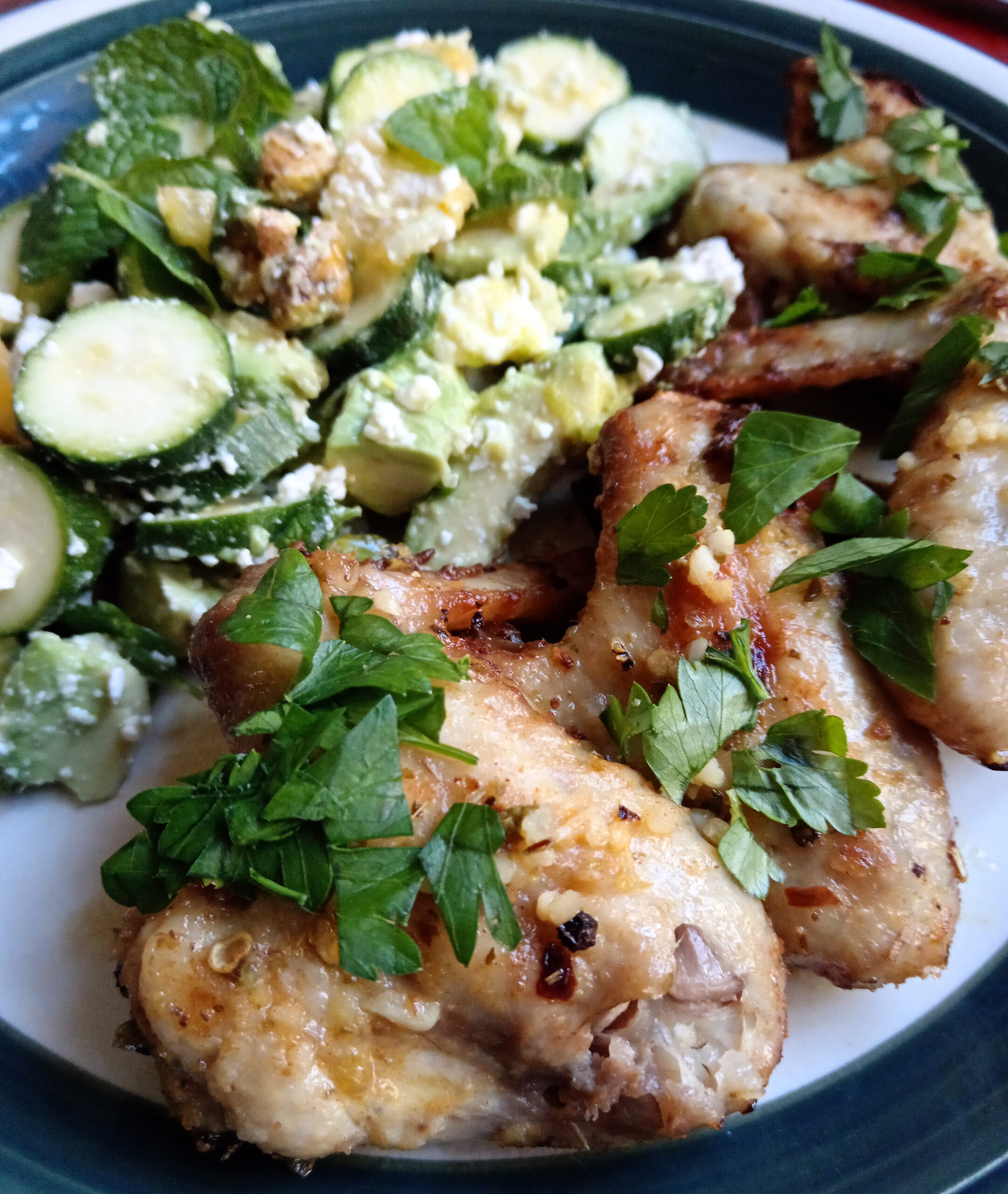 Cuban Mojo Chicken Wings served with a baby marrow, avocado, feta, pistachio and mint salad.
