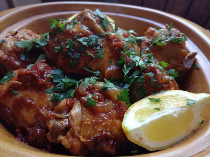 Tender chicken pieces in a glossy, sweet-and-tangy tomato sauce, served in a rustic dish with fresh parsley and a wedge of lemon — a comforting keto meal made in the Instant Pot.